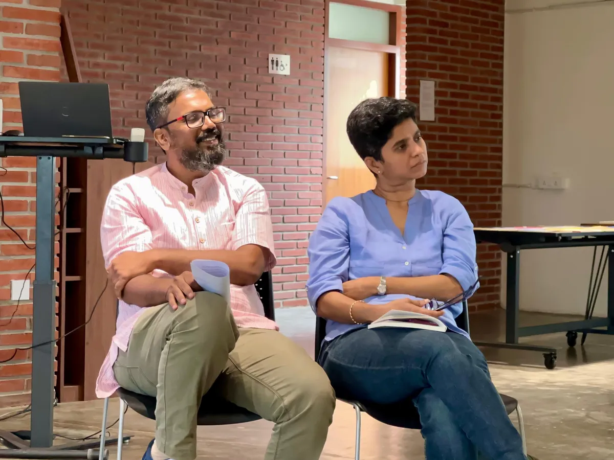 Ramya of WeLive Foundation and Shemeer speaking at an event